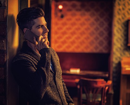 handsome man talking on cell phone
